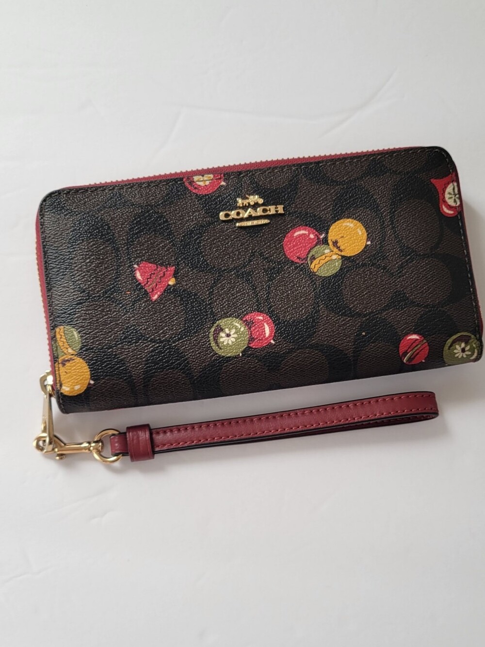 COACH long zip-up canvas wallet with ornament print